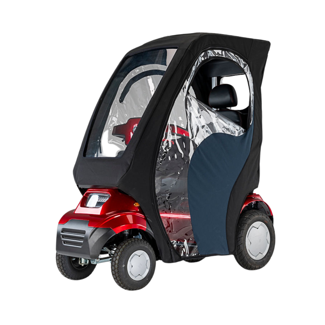 The Afikim Electric Vehicle Accessories include a compact red mobility scooter with a black removable canopy featuring clear plastic windows. It offers various customization options and tires suitable for different terrains.